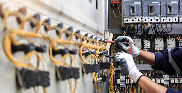 Professional Electrician technician working in Palmetto Bay, FL